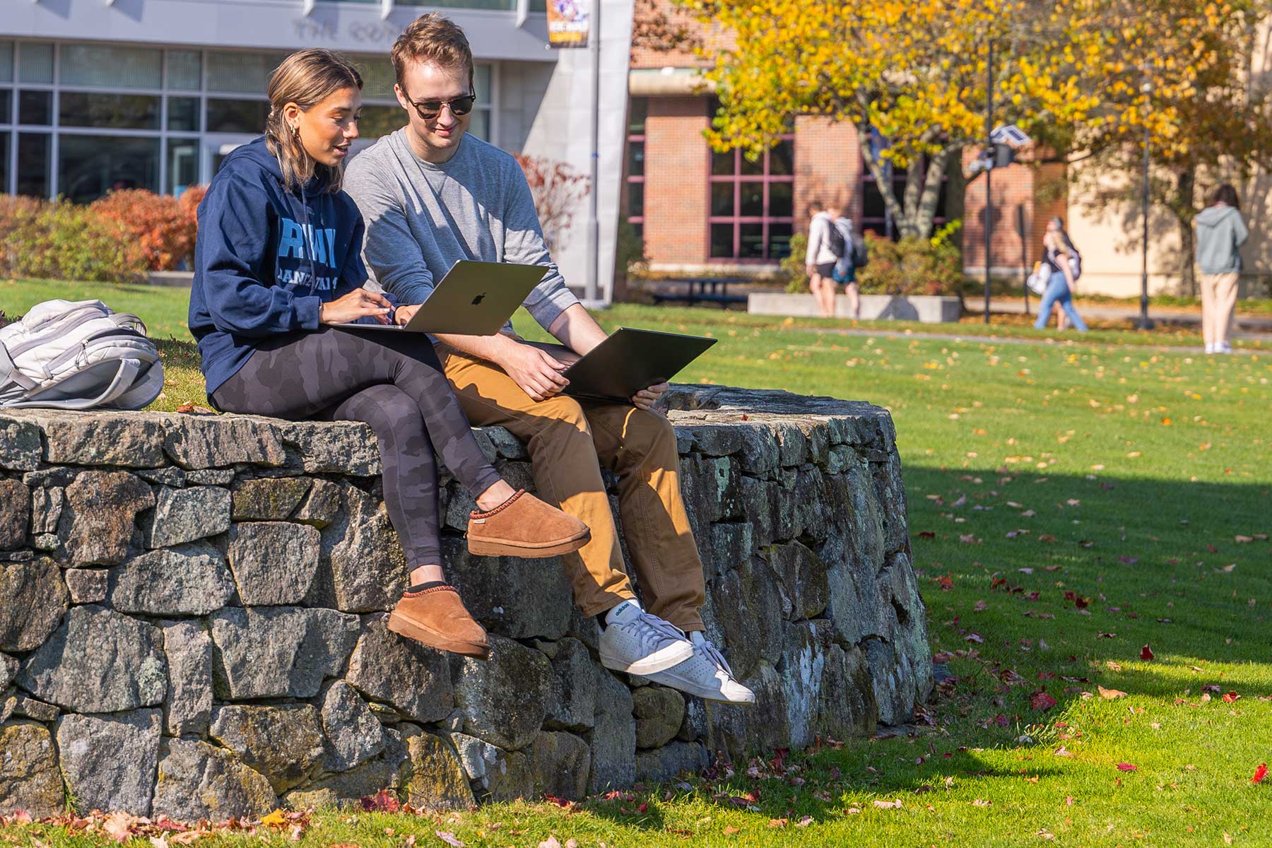 students sitting outside